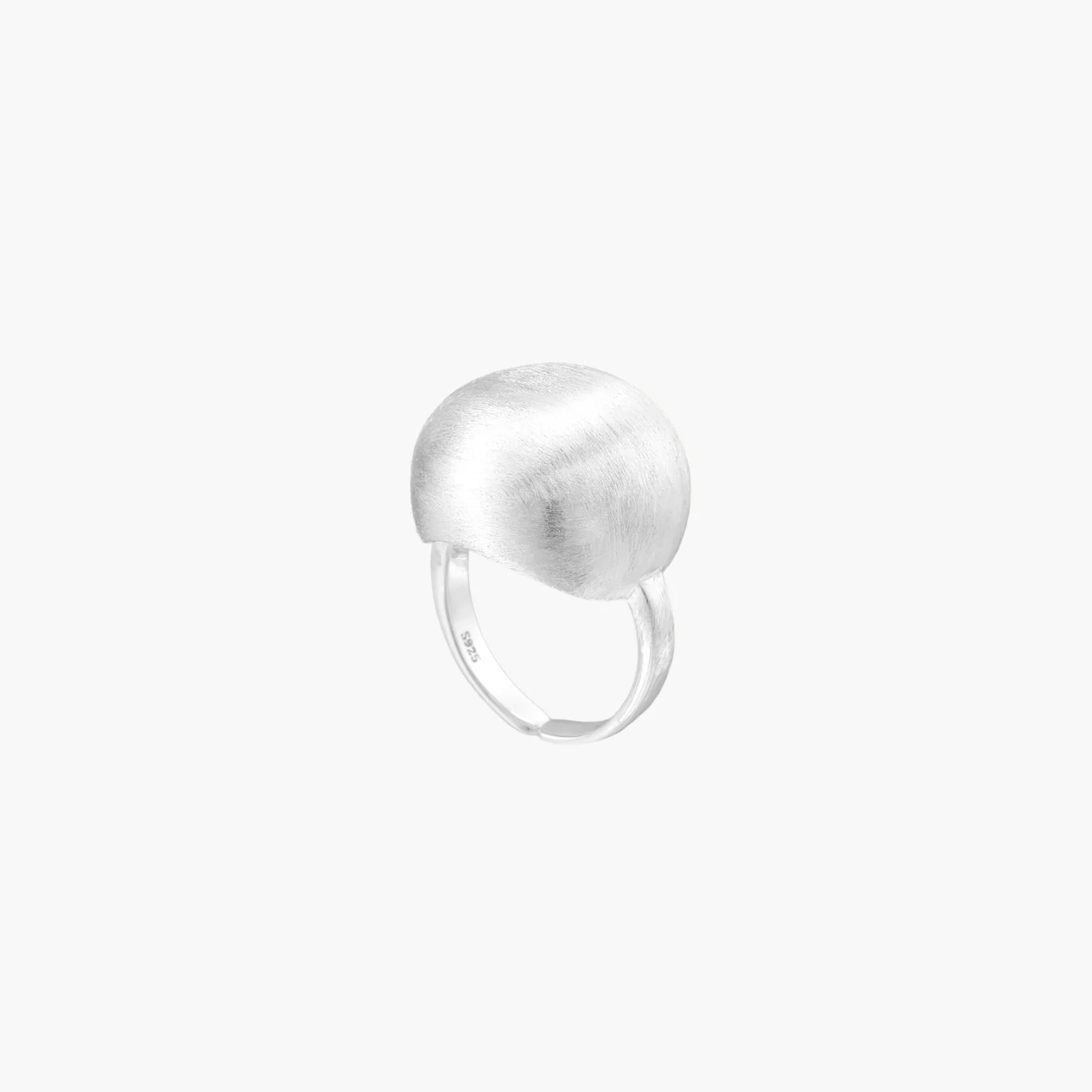 Minimalist brushed sterling silver dome ring with adjustable band on white background, front view.