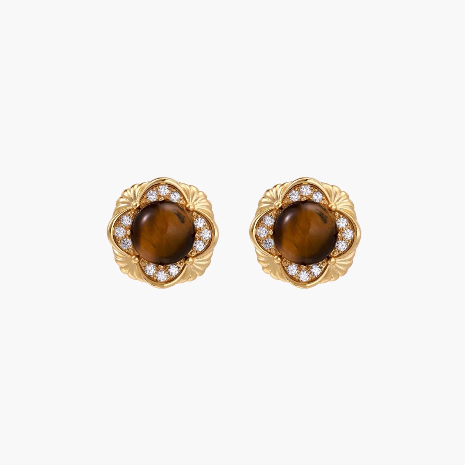 Gold-plated stud earrings with ornate floral frames surrounding cabochon tiger's eye stones and zirconia accents