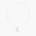 Abstract S-curve sterling silver pendant with zirconia accents on delicate chain against white background