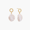 18K gold vermeil twisted circle studs with organic white baroque pearl drops on cream background