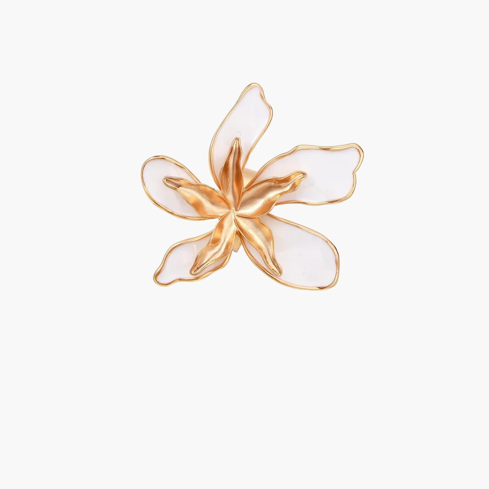 Gold-plated sculptural ring featuring white enamel petals forming an oversized lily bloom on adjustable band
