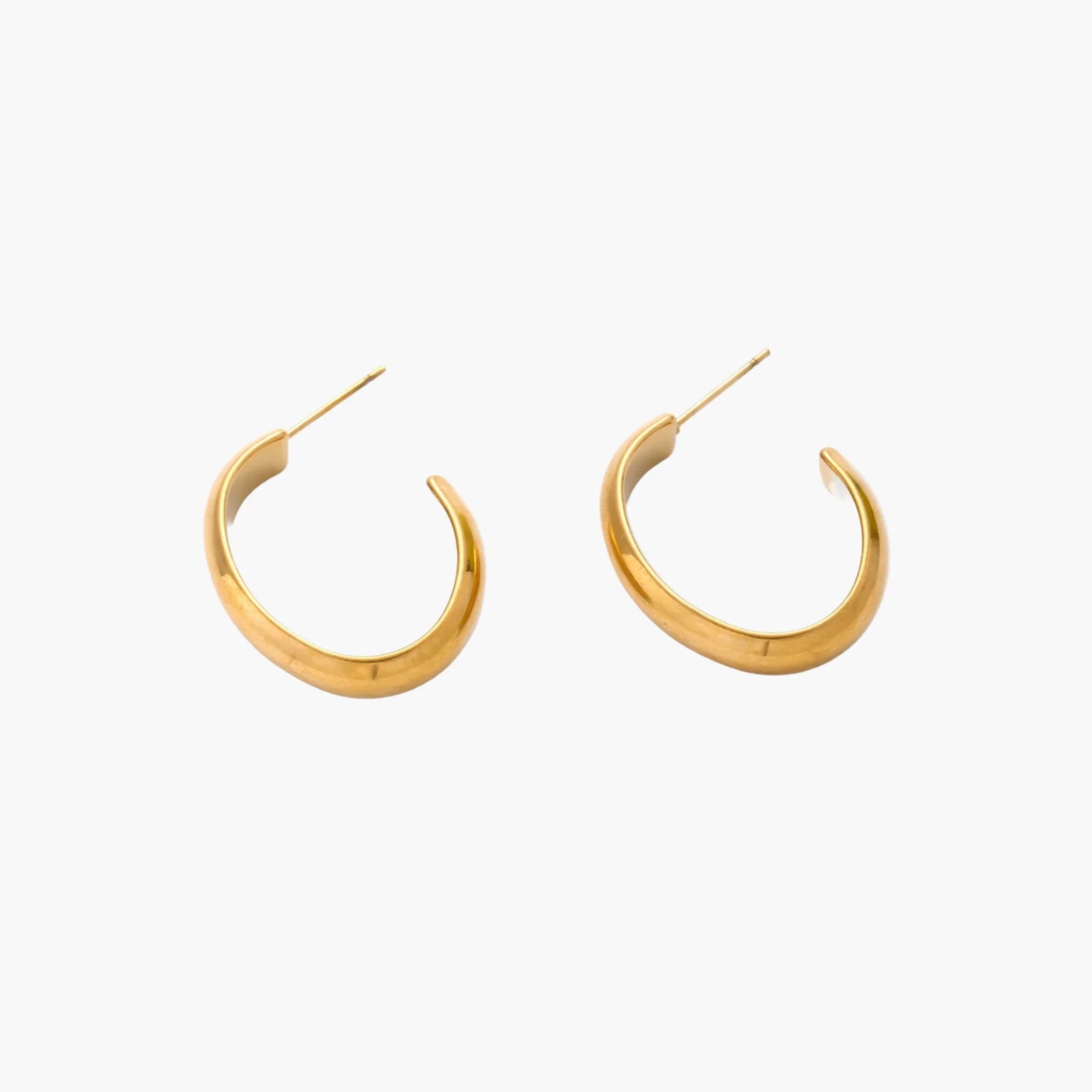 Chunky brushed gold hoop earrings in 14K plated stainless steel on cream background, front and side view.