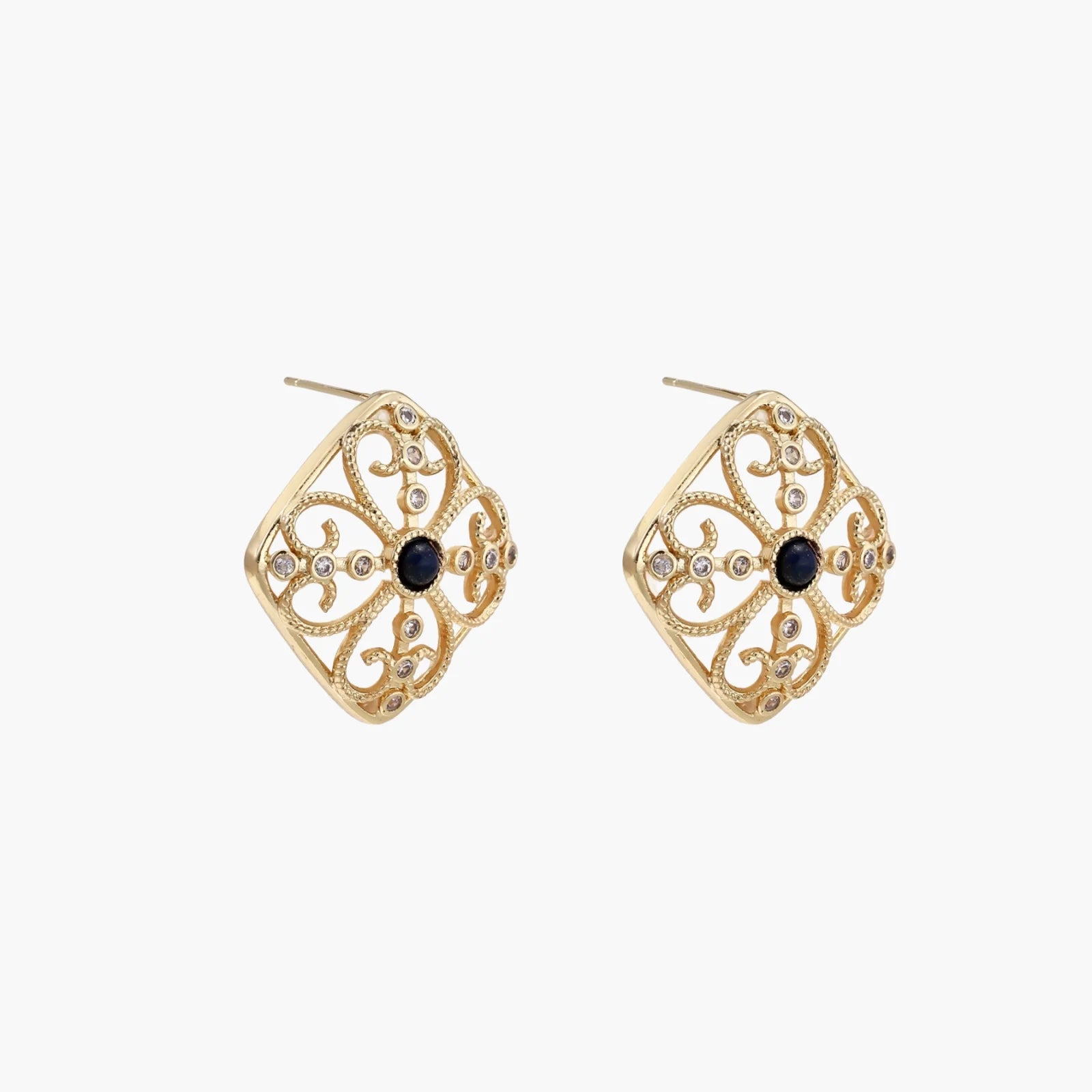 Gold filigree stud earrings with navy lapis lazuli center stone and mother-of-pearl accents in ornate quatrefoil design