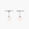 Rhodium-plated sterling silver ear jacket earrings with diamond-set horizontal bar and freshwater pearl drop
