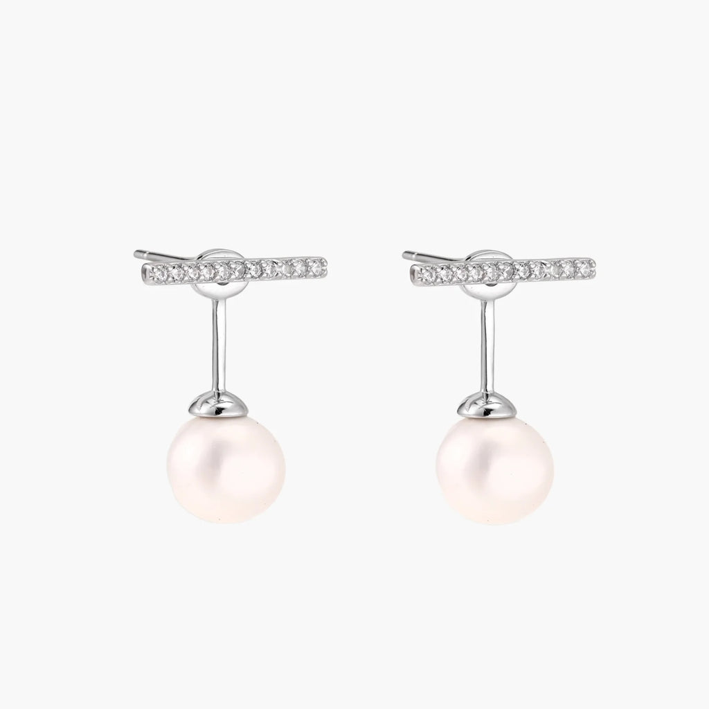Rhodium-plated sterling silver ear jacket earrings with diamond-set horizontal bar and freshwater pearl drop