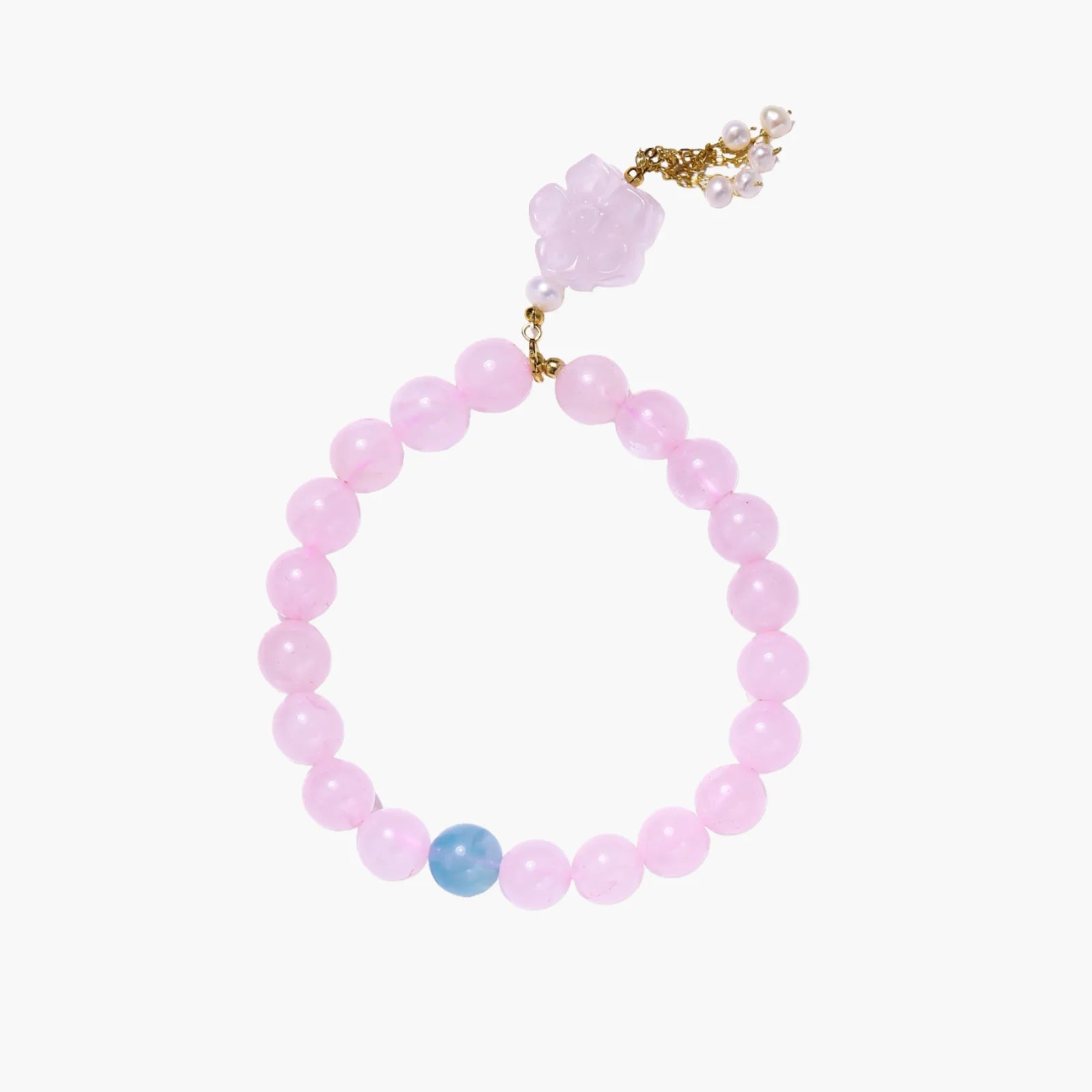Stretchy beaded bracelet with pink rose quartz, blue aquamarine, carved floral pendant, and pearl tassel clasp.