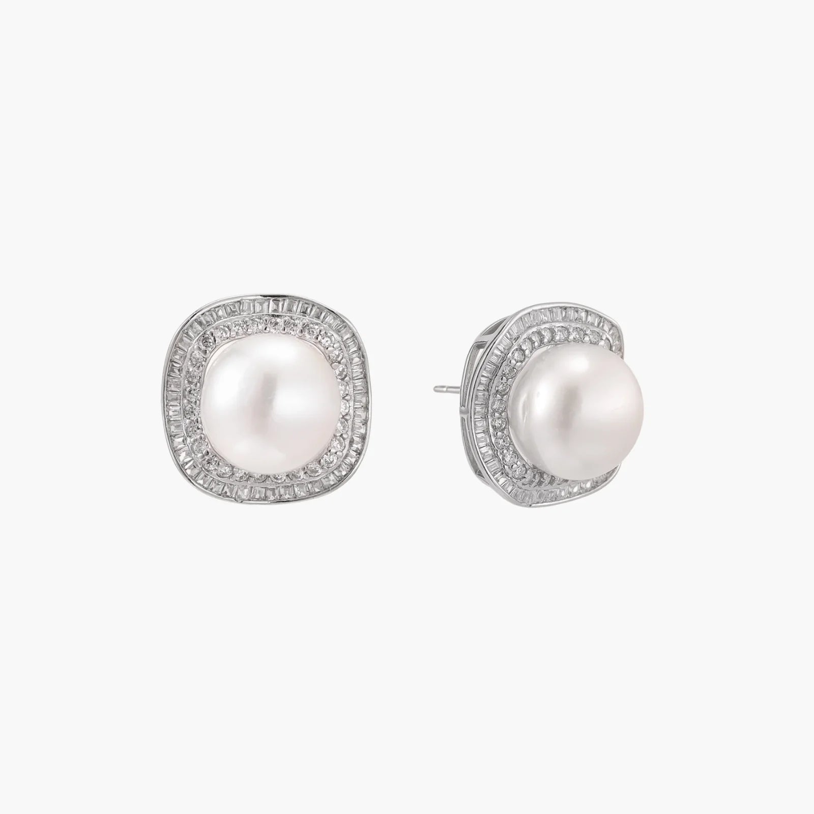 Cushion-shaped sterling silver stud earrings with freshwater pearls surrounded by geometric diamond halos